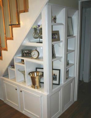 Shelving unit built under the stairs