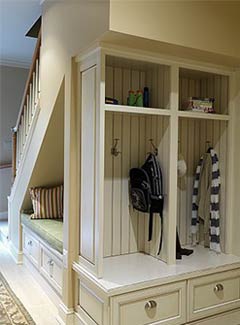 Seating area including coat and bag storage