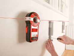 Using a Spot Laser Level to align and level brackets on a wall