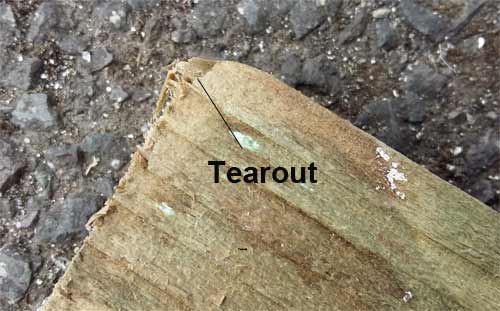 Tearout caused by rasping across timber grains