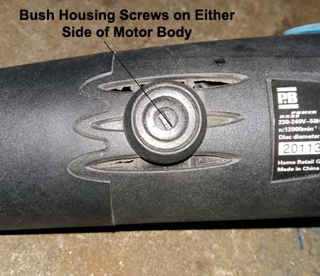 Bush housing screws on side of motor body