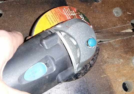 Practicing holding an angle grinder