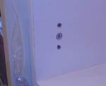 Hinge holes for wall unit door