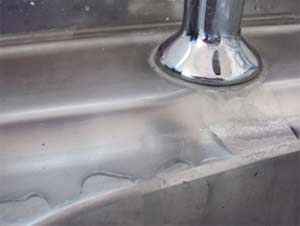 Check behind your appliances for any leaks