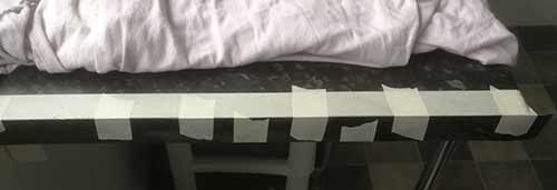 Add tape to laminate worktop strip